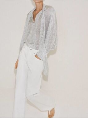 This white sheer blouse is by Rachel Roy